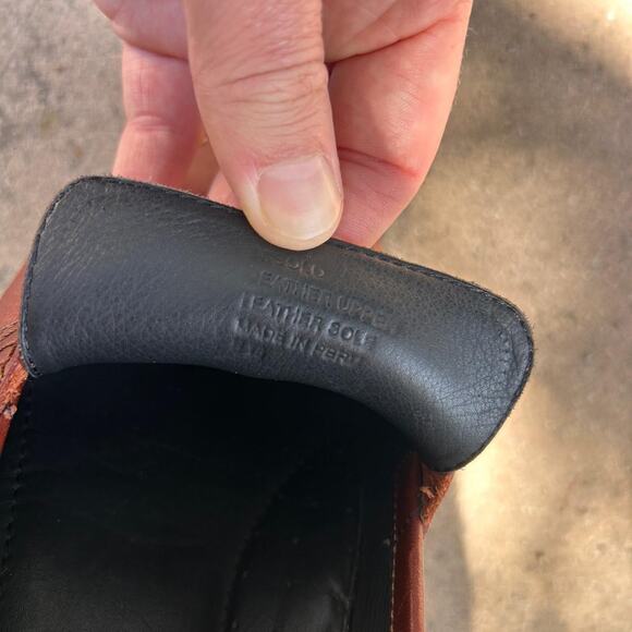 Brown leather loafers with a